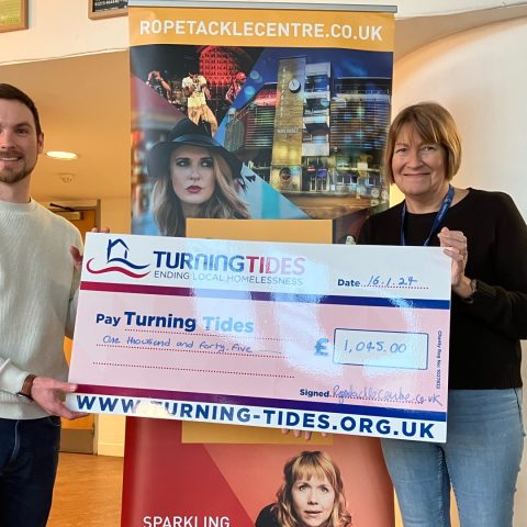Mark Phillips, left awards a cheque for £1045 to Sue Harris of Turning Tides.